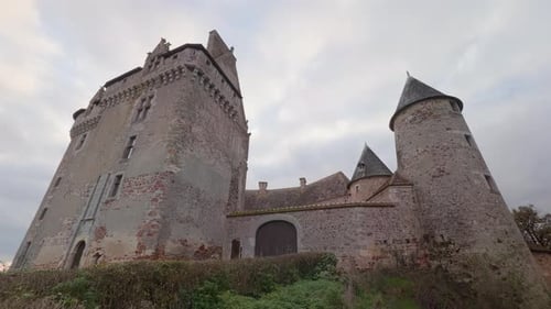 Historic Château du Bouchet in Rosnay France with medieval architecture and scenic stone towers