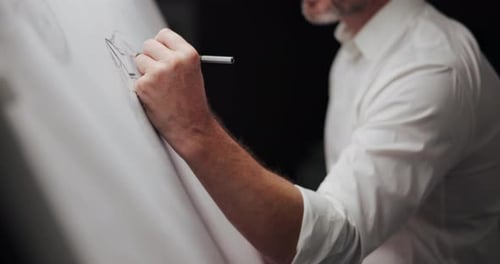 Hands, architect and board with building design, lines and creativity for editing process