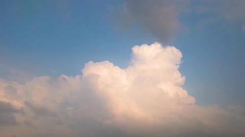 Clouds Moving Across Light Blue Sky