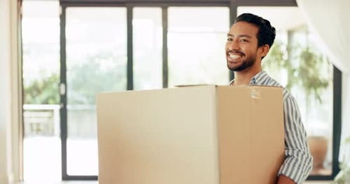 New, homeowner and man with a box, real estate and property investment with dream house