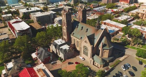 Magnificent building of Madeleine Cathedral among the urban architecture.