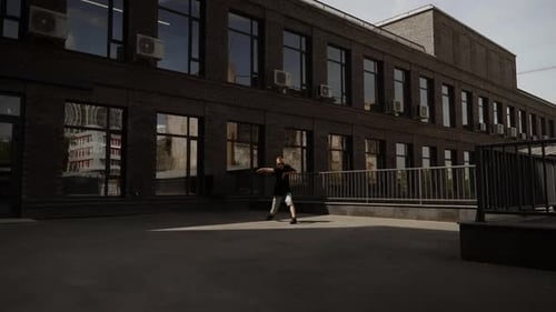 Dance Against the Backdrop of Industrial Buildings Hip Hop in the City Electro Dance Young Man