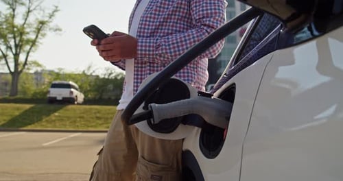 Electric Car Charging in Suburban Area