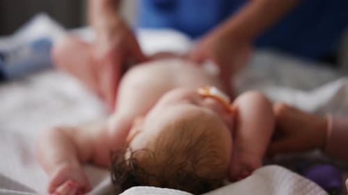 Relaxing Infant Getting Gentle Massage at Home