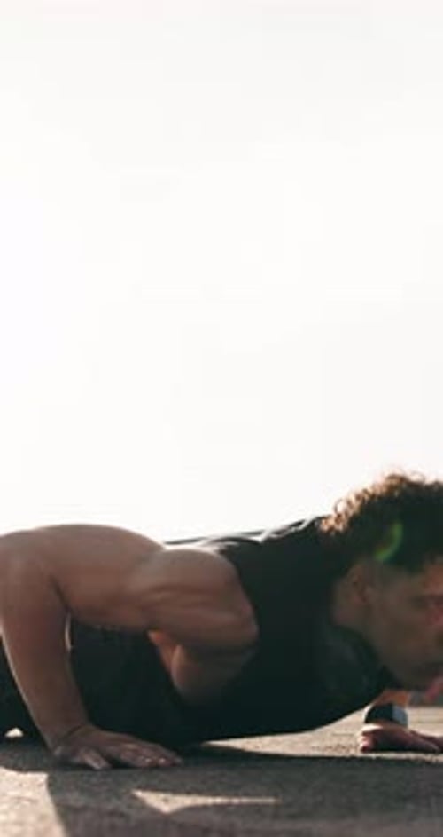 Outdoor, push up and man with exercise, training for health benefits or endurance