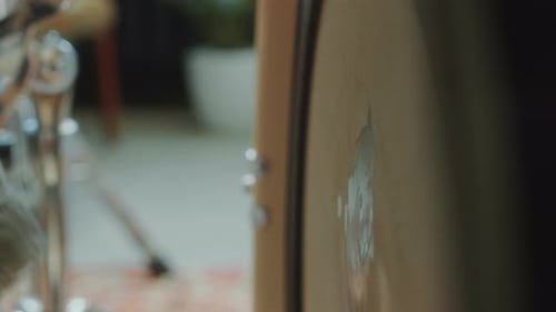 Beater Striking Kick Drum as Playing Music on Drum Kit