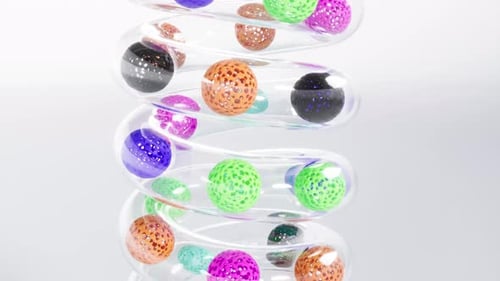 Sphères Speed Color dans un tube incurvé en verre Simply Motion Graphic