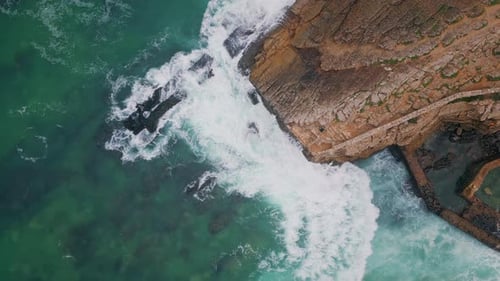 Sea Crashing Rocky Coast Creating Foam Aerial View Picturesque Clear Water