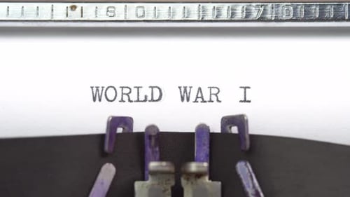 World War 1 word closeup being typing and centered on a sheet of paper on old vintage typewriter
