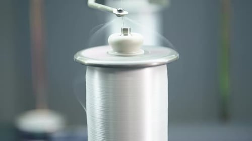 Machine Winding Silver Wire onto a Spool