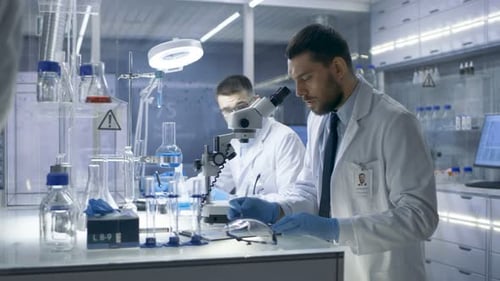 Researchers Working in Modern Science Laboratory