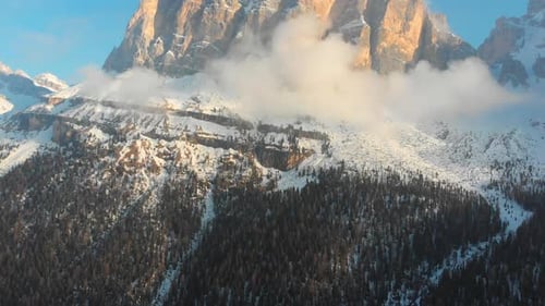 Breathtaking Landscape of Mountains with Snowy Summits and the Green