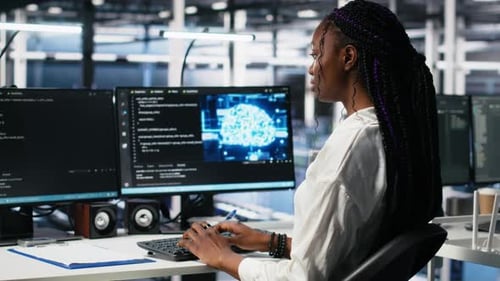 Technicians in Data Center Review AI Diagnostics Analyzing Neural Networks