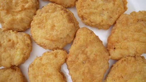 Chicken nuggets in stunning footage. 4K.