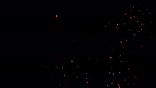 Fiery Sparks and Embers on Black Background