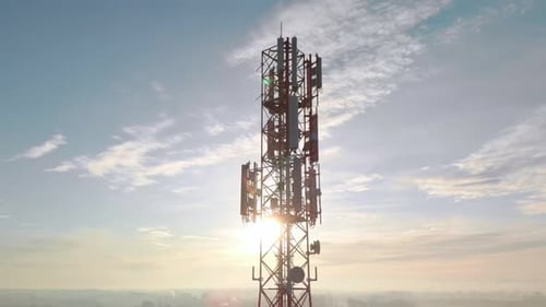Drone close up Telecom tower and Microwave Antennas with transmiting Cellular 4G & 5G mobile signals