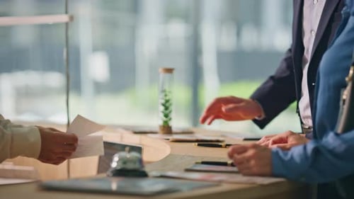 Closeup Client Hands Paying Contactless with Mobile Phone Hotel Guests Check in