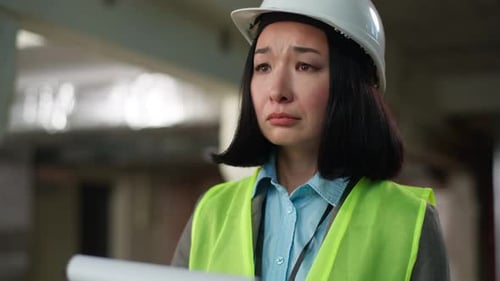 Upset Confused Asian Korean Japanese Woman in Hard Hat Builder Architect Reading Checking Document