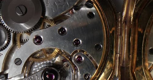 The inside of an old clock