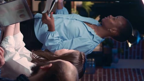 Team Collaboration in Warmly Lit Office Environment