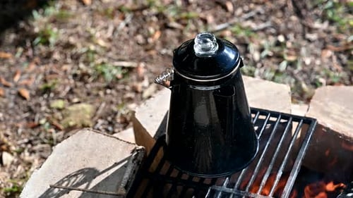 Coffee Pot on Fire in the Woods