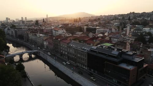 Sunrise Aerial View of European City and Canal