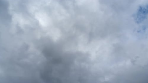 Timelapse cloudy sky during daytime.