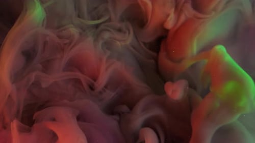 Swirling Paint Mixing Underwater with Colors and Texture