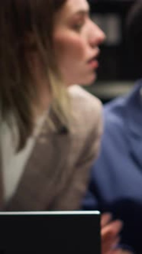 Business People Reviewing Documents in an Office
