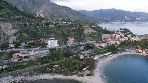 Beach And Island Isola Bella In Taormina, Sicily, Italy - Drone Shot