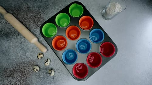 Cupcakes in Muffin Tin With Rolling Pin