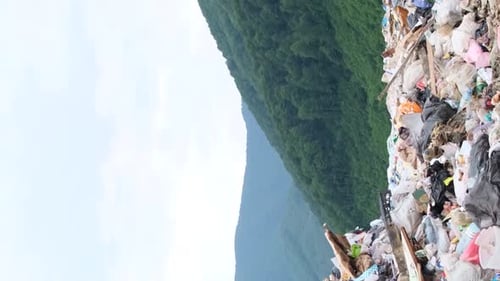 Large Landfill of Plastic Bags and Plastic Bottles Mu Kang Chai a Mountain in Vietnam Vertical