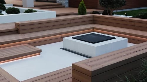 Fireplace on an Outdoor Patio with a Long Wooden Bench Picnic Area Near the House Large Builtin
