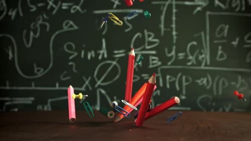 Pencils Fall on the School Desk Filmed on a Highspeed Camera at 1000 Fps