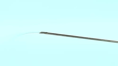 A Clear Liquid Medicine or Vaccine for Injection Drips and Pours From the Needle