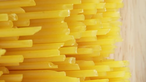 Close-Up of Uncooked Spaghetti Pasta on Wood