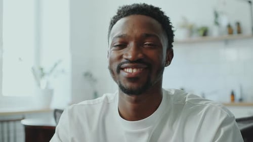 Smiling Man Close Up Indoors During Daytime