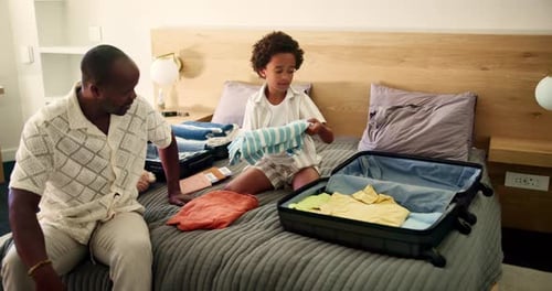 Father, child and packing suitcase in home for holiday trip, weekend getaway