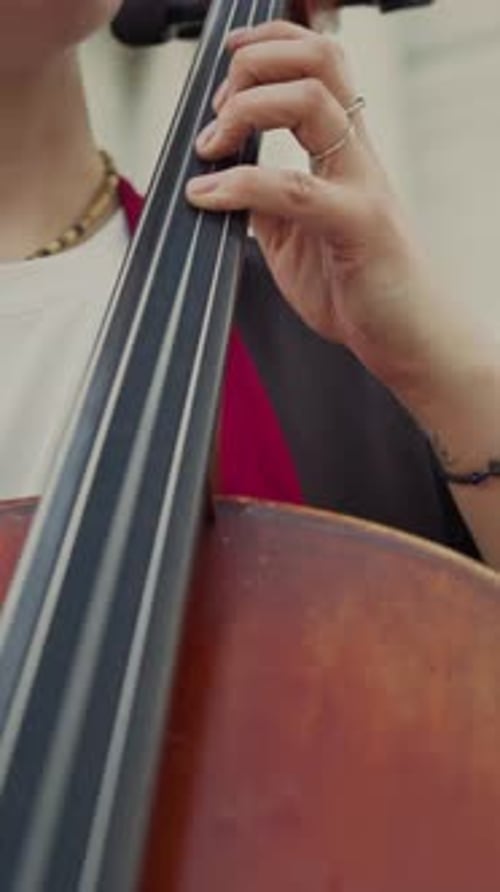 Close-Up of Female Classical Musician Playing Violoncello