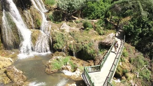 Aerial View Of Male Tourist Visiting The Waterfall 2