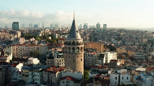 aerial pull out shot of the iconic Galata Tower in Istanbul, Turkey.