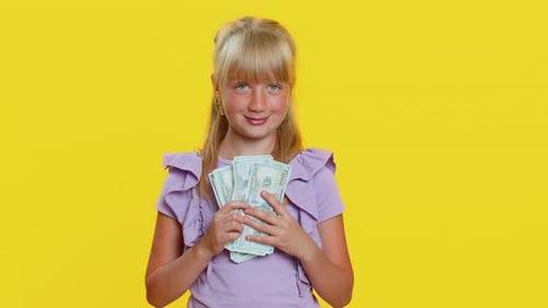 Happy Young Girl with Money in Her Hands