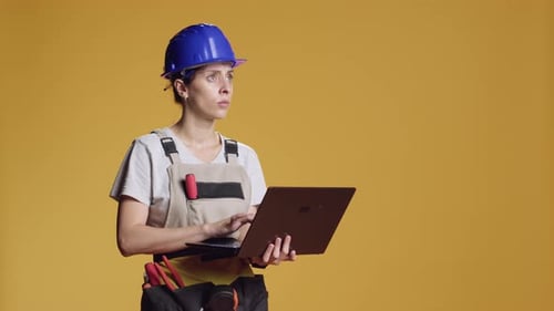 Confident Woman Browsing Internet on Laptop Pc
