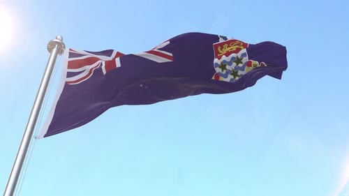 Cayman Islands Flag Waving in Blue Sky