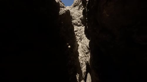 A Narrow Passage Between Two Large Rocks