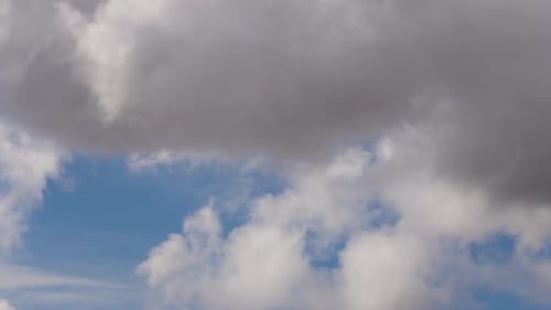 Clouds Pass in a Blue Sky Daytime