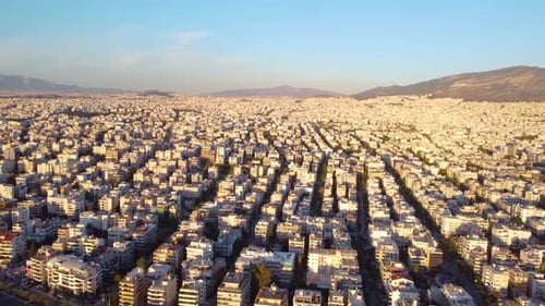 Aerial View Of Athens City Buildings On A Sunny Day In Greece. - pullback shot