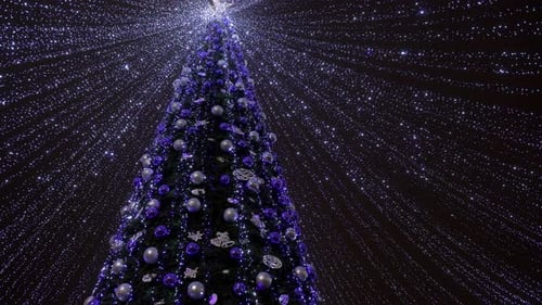 Christmas Tree Shimmering with Lights at Night