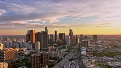 Aerial Shot Over Los Angeles Sunset Over California City Downtown LA at Sunset Drone View of Los