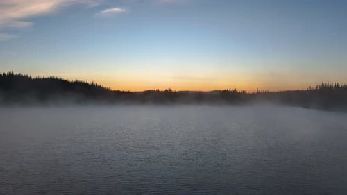 Moody morning on a lake in British Columbia, Canada.